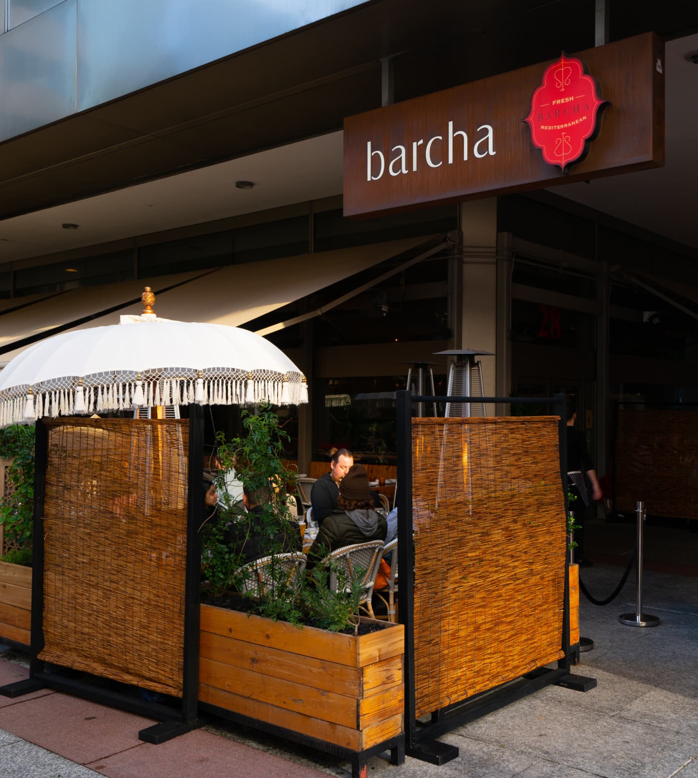 People eating outside at Barcha Restaurant